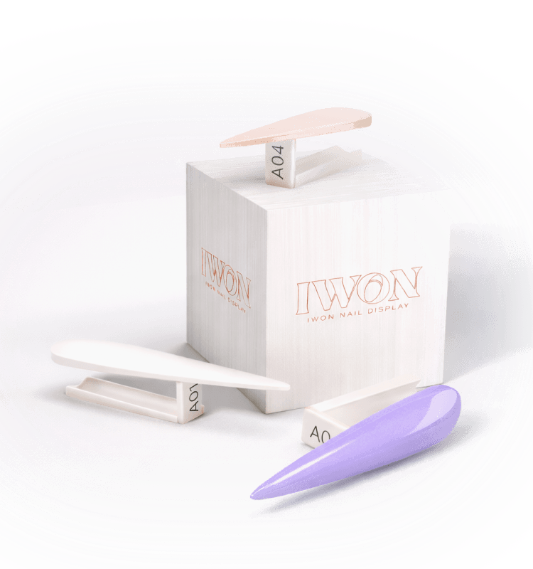 Colorful nail polishes in various shades displayed on a box with the Iwon brand logo
